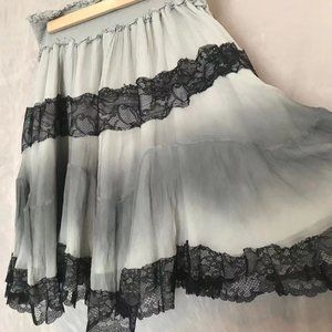 In great condition, 100% silk , gradient grey skirt with lace